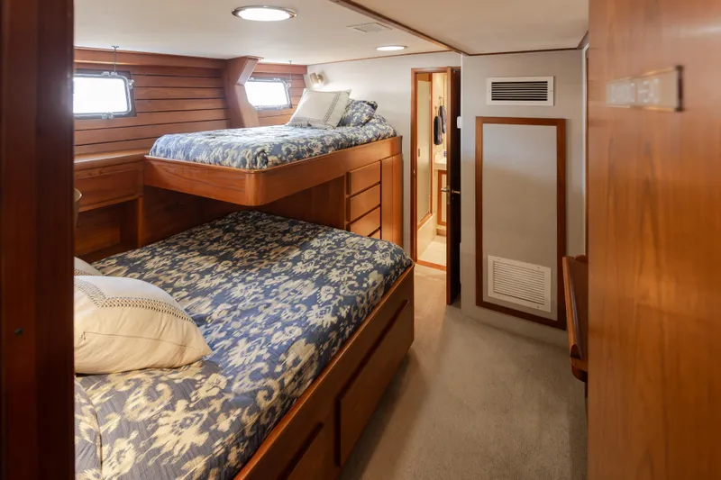  Yacht Photos Pics Cozy 1974 Willard 1201 yacht cabin with bunk beds and wooden interior.