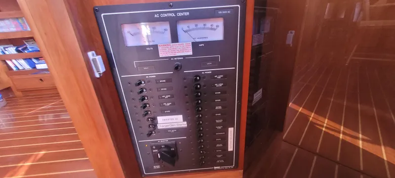 Midnight Yacht Photos Pics AC control panel on 2001 Sabreline 43 Flybridge Motoryacht with Cockpit.