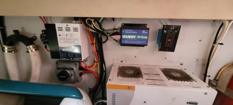 Midnight Yacht Photos Pics Engine room of 2001 Sabreline 43 Flybridge Motoryacht with electrical components and wiring.