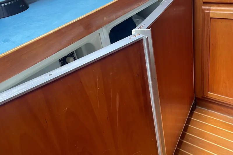 Midnight Yacht Photos Pics Wooden cabinetry detail on 2001 Sabreline 43 Flybridge Motoryacht interior.