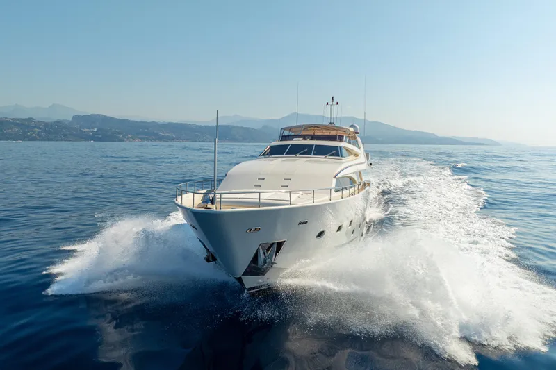 Champagne And Caviar Yacht Photos Pics 2003 Ferretti Yachts Custom Line 112 cruising on open water.