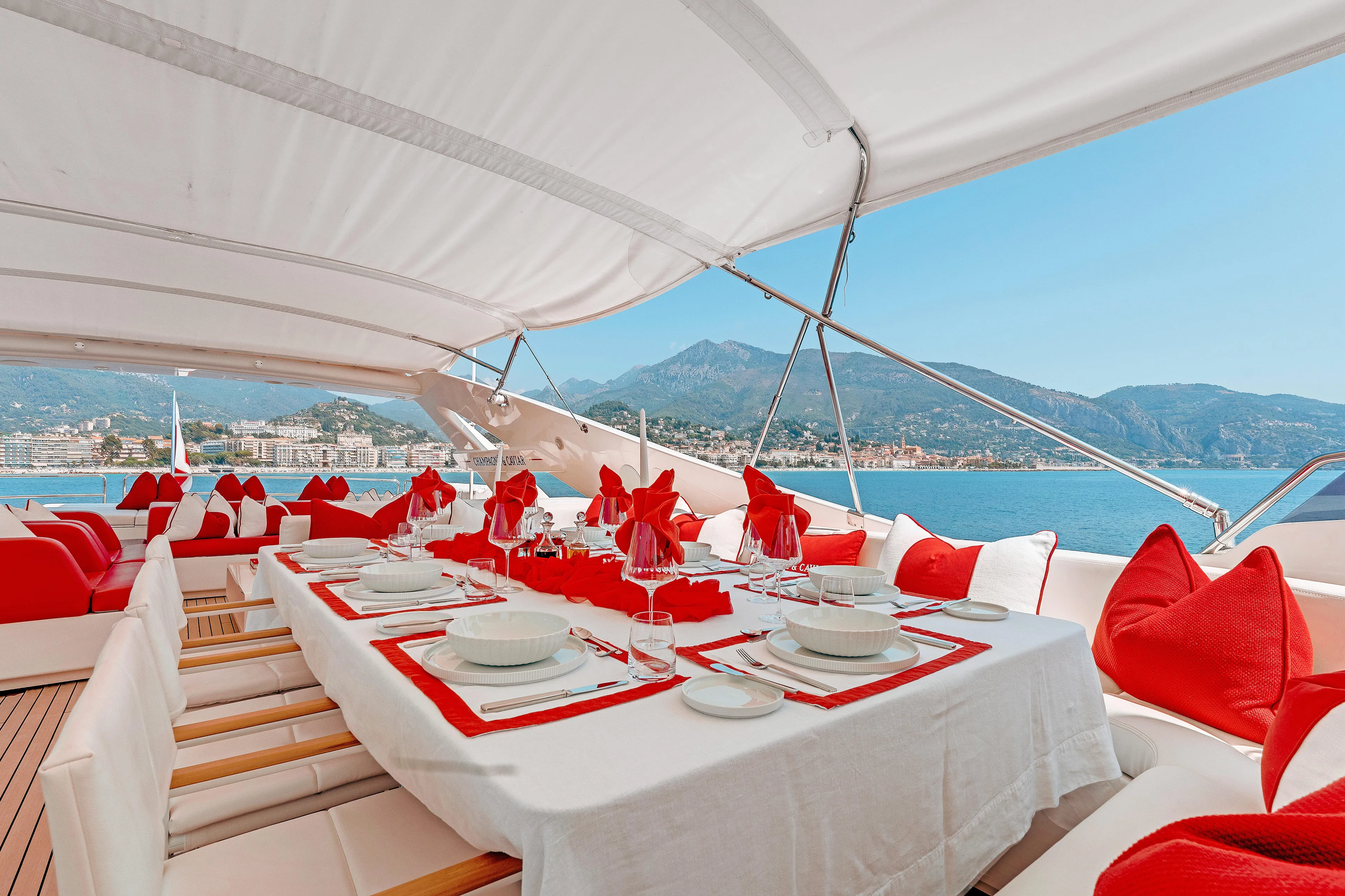 Champagne And Caviar Yacht Photos Pics Luxurious dining setup on 2003 Ferretti Yachts Custom Line 112, with scenic ocean view.