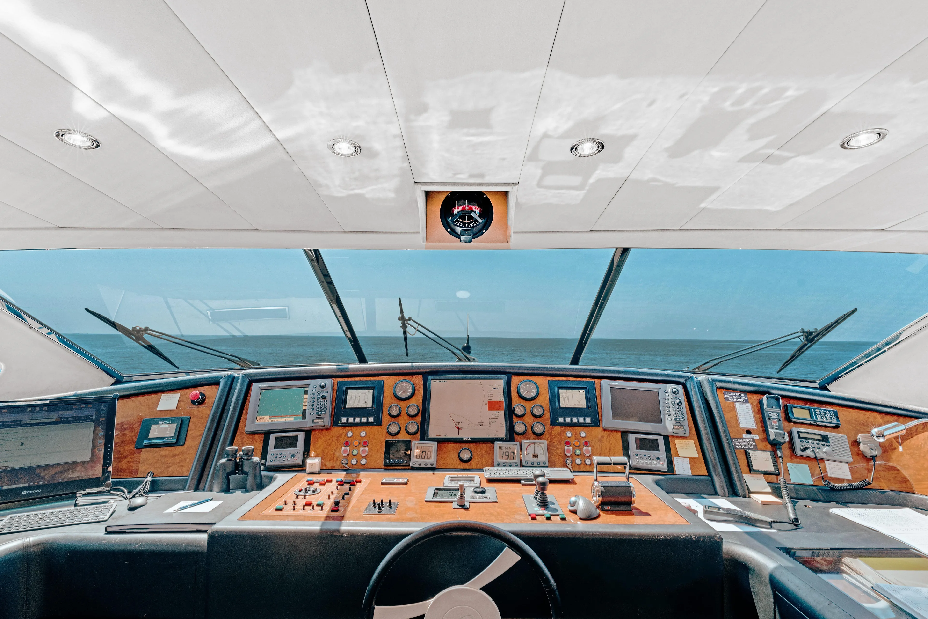 Champagne And Caviar Yacht Photos Pics Cockpit of 2003 Ferretti Yachts Custom Line 112, featuring advanced navigation equipment.