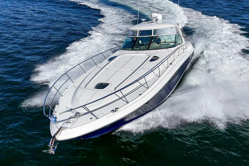 Enough 4 Now! Yacht Photos Pics 2005 Sea Ray 500 Sundancer yacht cruising on open water.