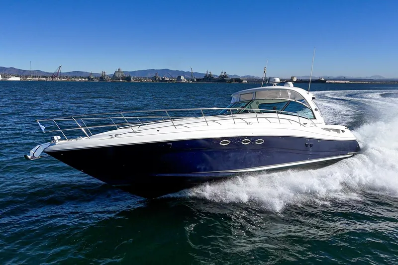 Enough 4 Now! Yacht Photos Pics 2005 Sea Ray 500 Sundancer yacht cruising on open water.