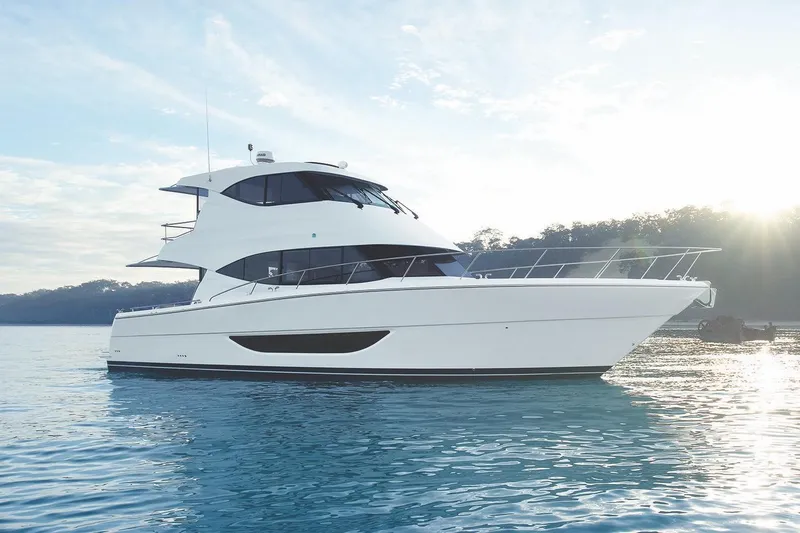 Rosewood Yacht Photos Pics 2020 Maritimo M51 yacht on calm water at sunrise.