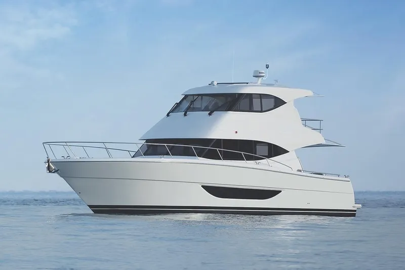 Rosewood Yacht Photos Pics 2020 Maritimo M51 yacht on calm water under clear blue sky.