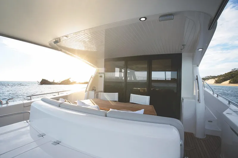 Rosewood Yacht Photos Pics 2020 Maritimo M51 yacht deck with ocean view at sunset.