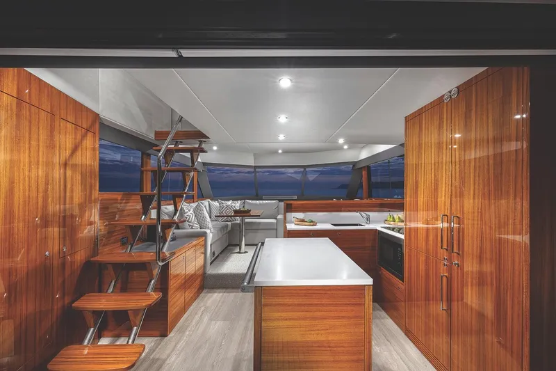 Rosewood Yacht Photos Pics Luxurious interior of 2020 Maritimo M51 yacht with modern kitchen and seating area.