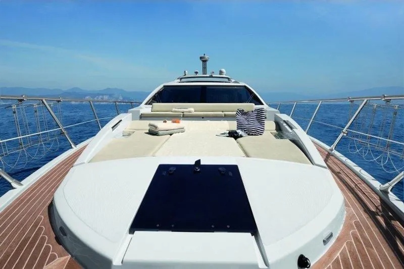  Yacht Photos Pics Azimut 55S 2012 yacht deck with sunbathing area, surrounded by ocean views.