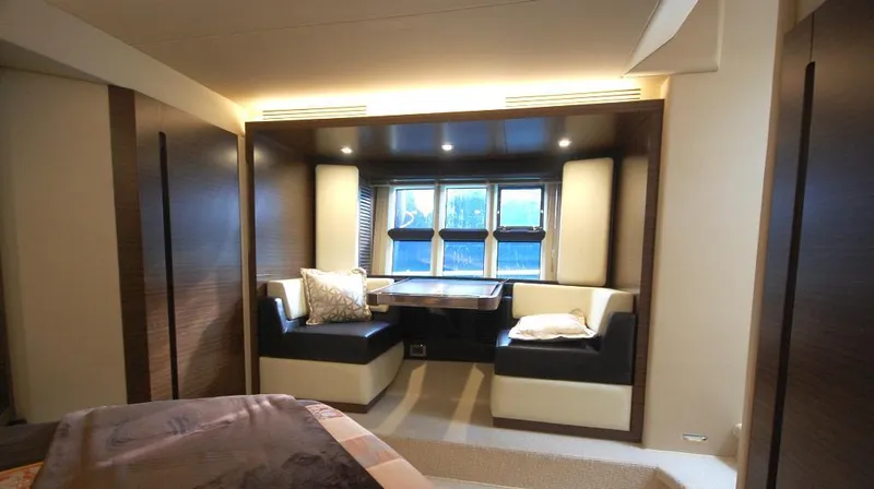  Yacht Photos Pics Luxurious interior of 2012 Azimut 55S yacht with elegant seating and ambient lighting.