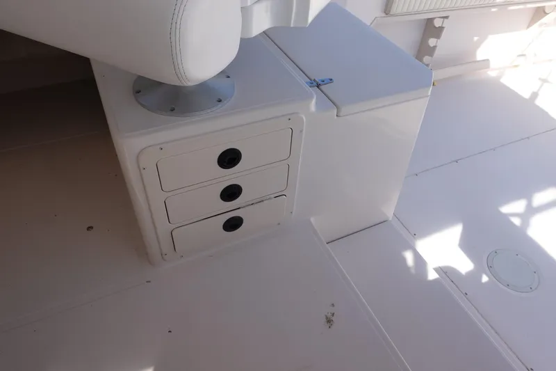  Yacht Photos Pics 2002 Grady White 300 Marlin boat interior with storage compartments and seating.