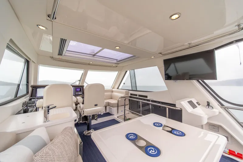 Evolution Yacht Photos Pics 2015 Riviera 50 Enclosed Bridge - ENVOLUTION