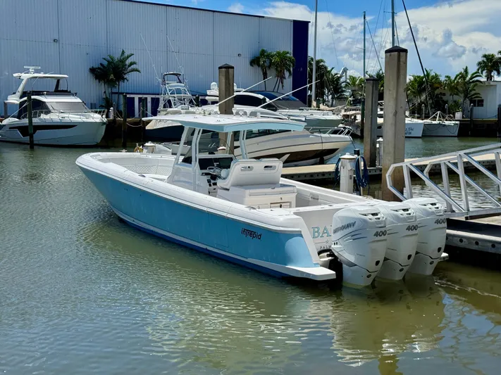  Yacht Photos Pics 2020 Intrepid 375 Nomad FE boat docked at marina with triple 400 engines.