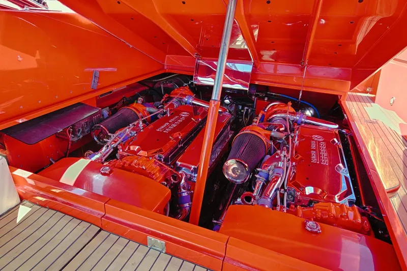  Yacht Photos Pics 2002 Hallett Express Cruiser engine compartment with dual high-performance engines.