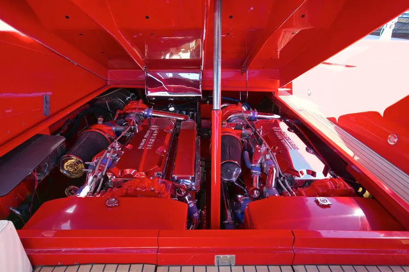  Yacht Photos Pics 2002 Hallett Express Cruiser engine compartment with dual high-performance engines.