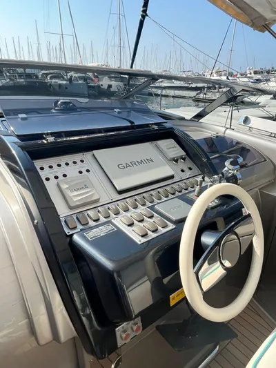  Yacht Photos Pics Control panel of a 2014 Riva Rivarama Super 44 yacht with Garmin navigation system.