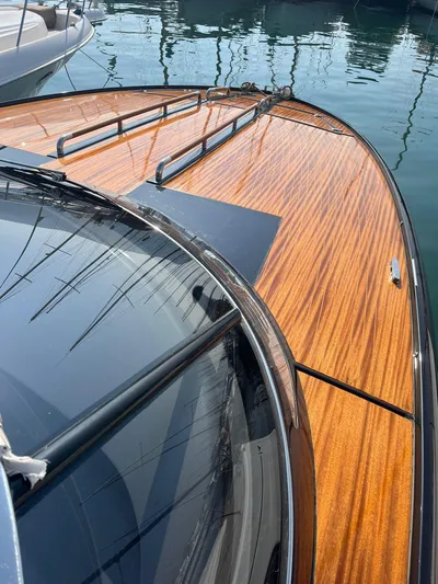  Yacht Photos Pics 2014 Riva Rivarama Super 44 luxury yacht with sleek wooden deck design.