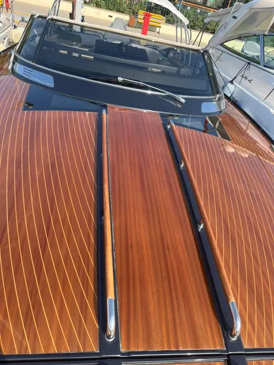  Yacht Photos Pics 2014 Riva Rivarama Super 44 yacht with sleek wooden deck and modern design.
