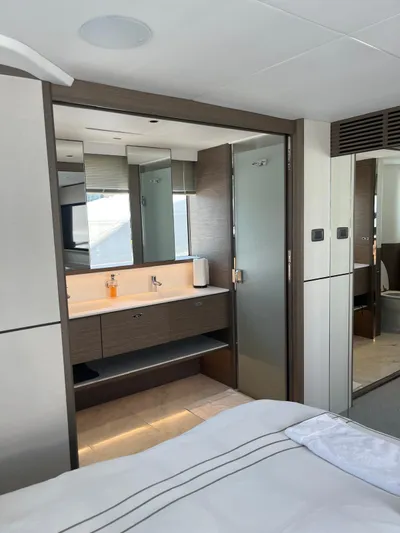  Yacht Photos Pics Luxurious bathroom interior of 2023 Princess X80 yacht, featuring modern fixtures and elegant design.