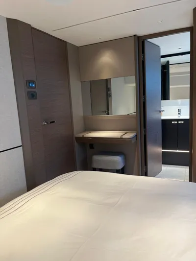  Yacht Photos Pics Luxurious interior of 2023 Princess X80 yacht cabin with modern design and elegant furnishings.