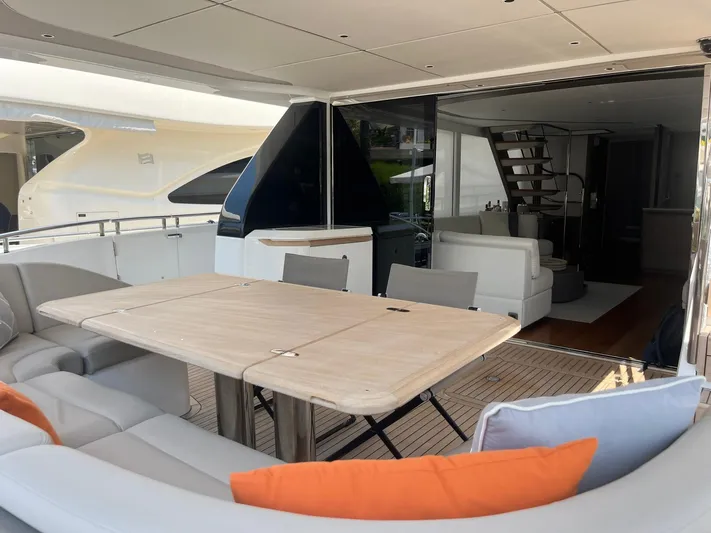  Yacht Photos Pics Luxurious 2023 Princess X80 yacht interior with elegant seating and dining area.