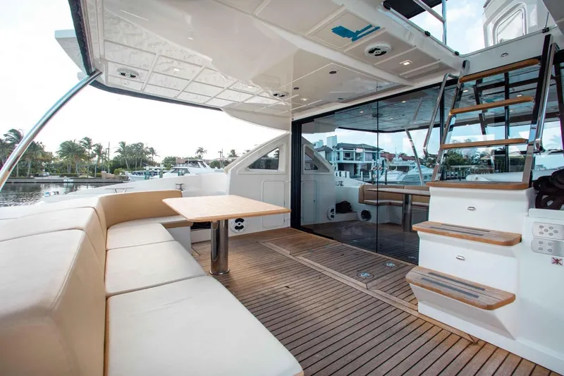 Yacht Photos Pics Luxurious 2015 Absolute 56 FLY yacht with spacious deck and elegant seating area.