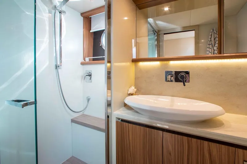  Yacht Photos Pics Luxurious bathroom in 2015 Absolute 56 FLY yacht with modern fixtures and elegant design.