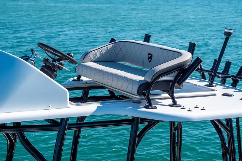  Yacht Photos Pics 2026 Barker Boatworks 26 Calibogue Bay helm with luxurious seating on blue water.