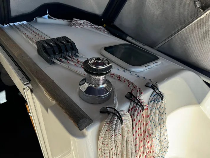 Interlude Yacht Photos Pics Deck of 2002 Beneteau 393 sailboat with winch, ropes, and hatch.