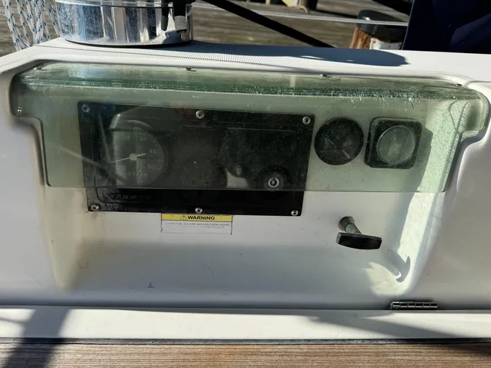 Interlude Yacht Photos Pics Control panel of a 2002 Beneteau 393 sailboat, featuring gauges and switches.