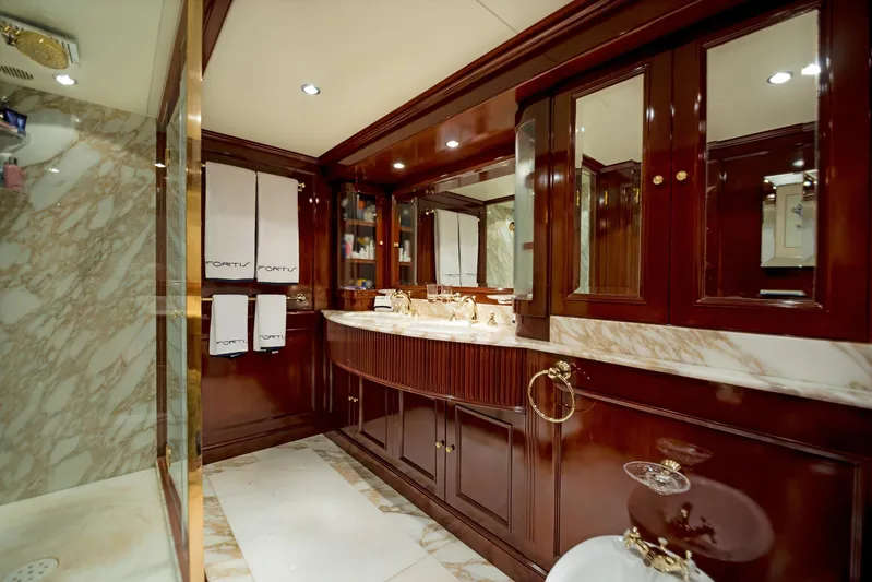Fortis Benetti 115 Classic Yacht Photos Pics Luxurious bathroom with marble accents on a 2003 Benetti 115 Classic yacht.