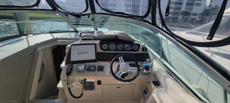  Yacht Photos Pics 2008 Sea Ray 350 Sundancer boat helm with navigation system and controls.