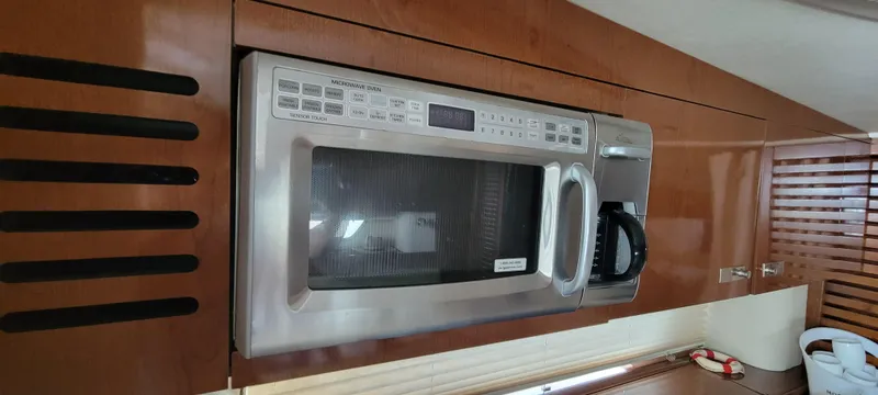  Yacht Photos Pics Built-in microwave in the 2008 Sea Ray 350 Sundancer yacht kitchen.