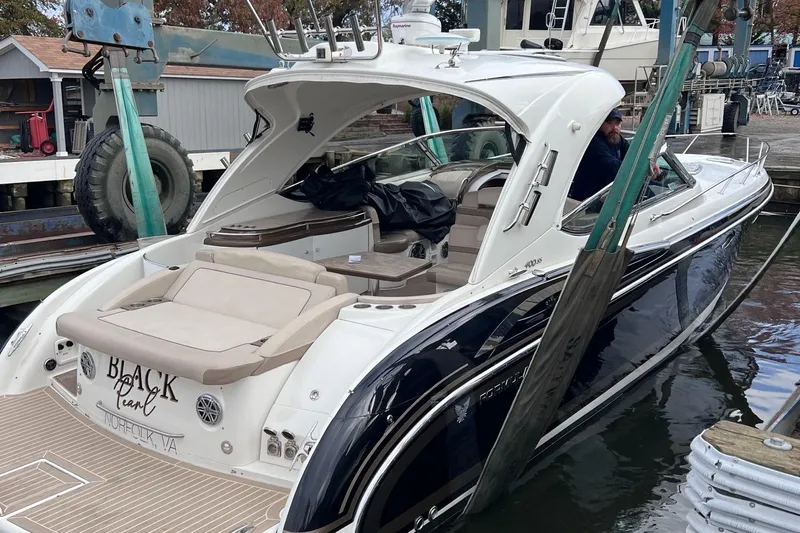  Yacht Photos Pics 2016 Formula 400 Super Sport boat docked, featuring sleek design and spacious seating.