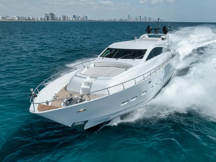 U Wish Yacht Photos Pics 2008 Arno Leopard Open Sport Yacht cruising on blue ocean near city skyline.