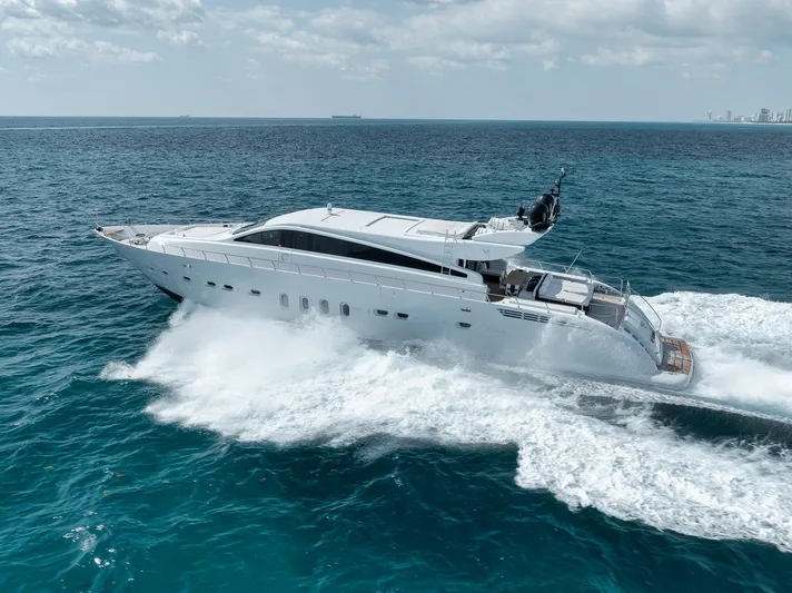U Wish Yacht Photos Pics 2008 Arno Leopard Open Sport Yacht cruising on open sea, creating waves.