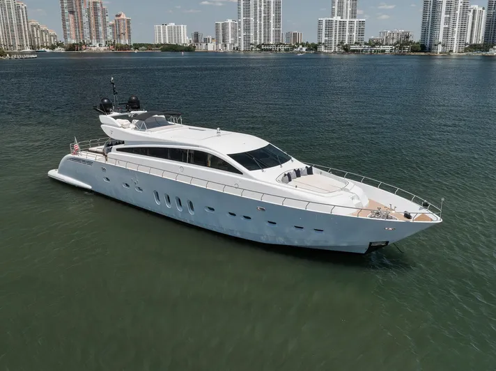 U Wish Yacht Photos Pics 2008 Arno Leopard Open Sport Yacht on water, city skyline in background.