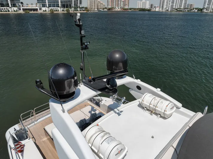 U Wish Yacht Photos Pics 2008 Arno Leopard Open Sport Yacht on water, featuring radar domes and life rafts.