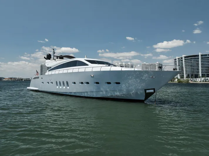U Wish Yacht Photos Pics Luxury 2008 Arno Leopard Open Sport Yacht on water, city skyline in background.