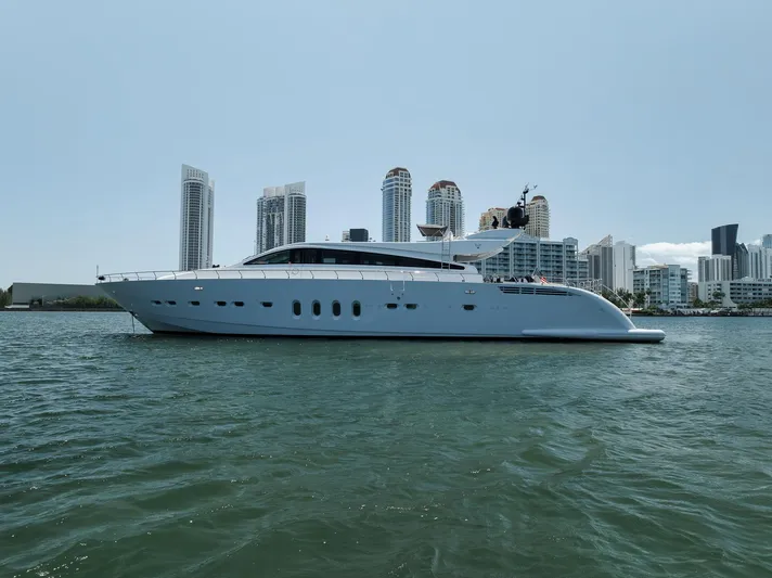 U Wish Yacht Photos Pics 2008 Arno Leopard Open Sport Yacht cruising near city skyline.