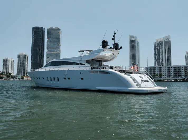 U Wish Yacht Photos Pics 2008 Arno Leopard Open Sport Yacht on water with city skyline backdrop.
