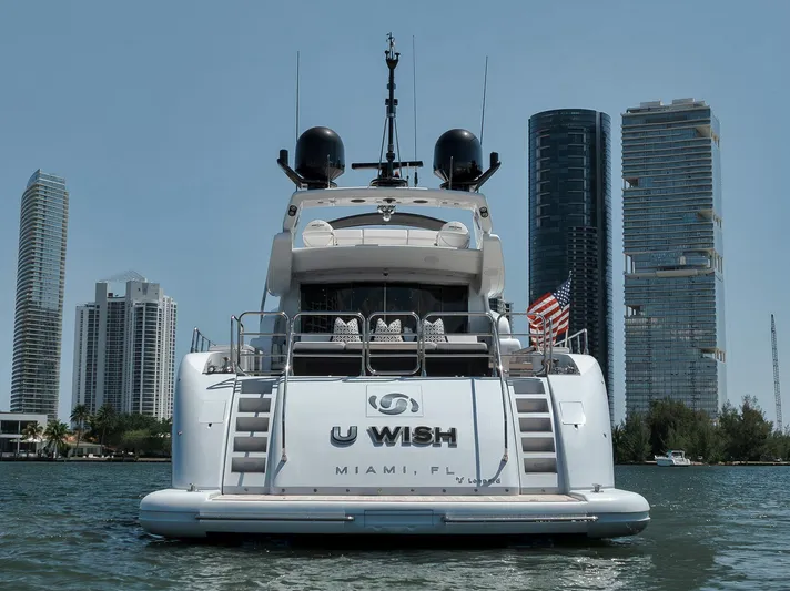 U Wish Yacht Photos Pics Arno Leopard 2008 Open Sport Yacht in Miami, with skyscrapers in the background.