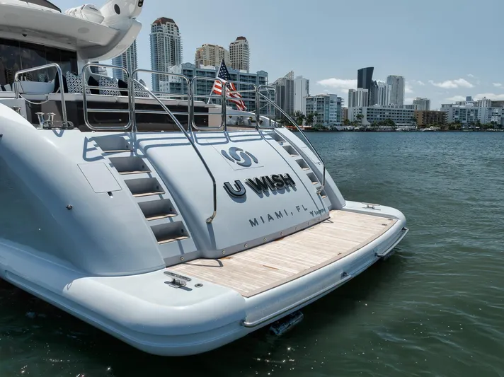 U Wish Yacht Photos Pics 2008 Arno Leopard Open Sport Yacht docked in Miami with city skyline backdrop.