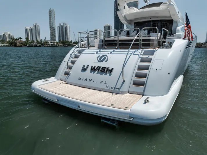U Wish Yacht Photos Pics 2008 Arno Leopard Open Sport Yacht docked in Miami with city skyline backdrop.