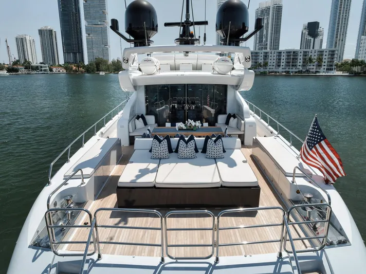 U Wish Yacht Photos Pics Luxurious 2008 Arno Leopard Open Sport Yacht with spacious deck and city skyline backdrop.
