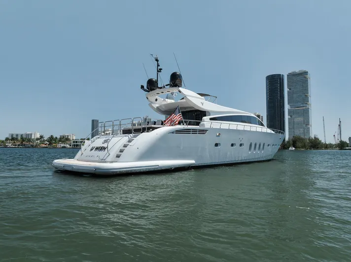U Wish Yacht Photos Pics 2008 Arno Leopard Open Sport Yacht on water, city skyline in background.