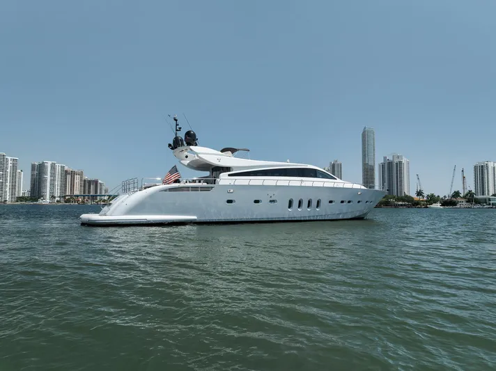 U Wish Yacht Photos Pics 2008 Arno Leopard Open Sport Yacht on water with city skyline background.