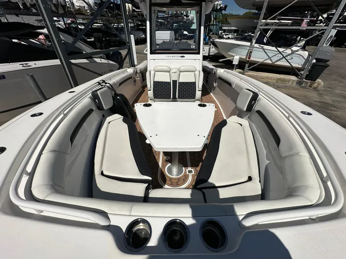  Yacht Photos Pics 2022 Tidewater 280 CC boat interior with spacious seating and modern design.