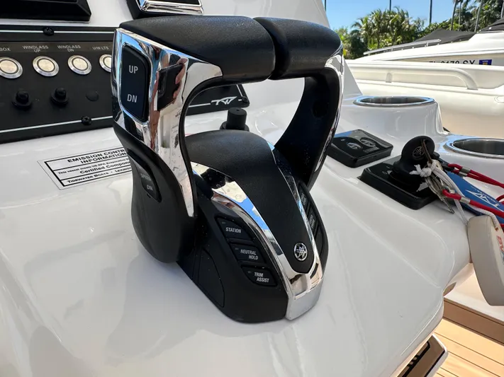  Yacht Photos Pics Throttle controls on a 2022 Tidewater 280 CC boat dashboard.
